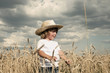 Photo: Blond boy in a field Blond boy in a field