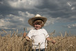 Photo: Blond boy in a field Blond boy in a field