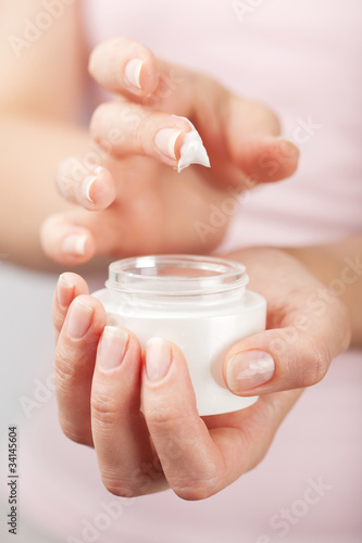 Photo: beautiful woman hands with cream beautiful woman hands with cream