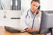 Serious doctor on the phone
