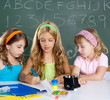 kids group of student girls at school classroom