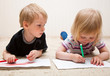 Boy and girl are painting