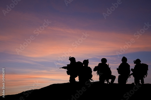 Photo: Silhouette of modern troops in Middle East silhouette Silhouette of modern troops in Middle East silhouette