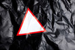 Black paper and Warning Sign