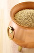 raw quinoa on copper pot