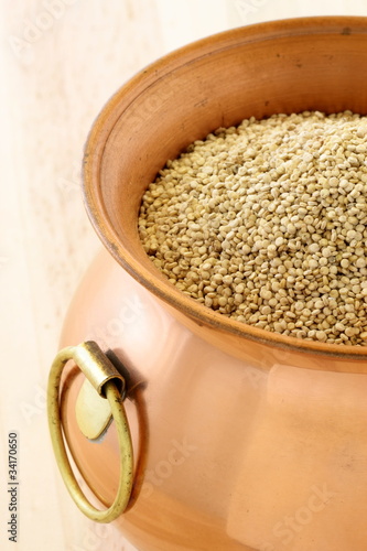 Photo: raw quinoa on copper pot raw quinoa on copper pot