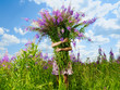 Girl with a giant bouquet of flowers