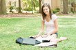 A pretty young college student with study materials A pretty young college student with study materials