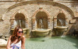 Girl close to the fountain Girl close to the fountain