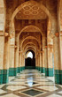 Intricate marble and mosaic archway outside mosque