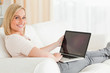 Blonde woman with a notebook