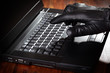 Thief stealing data from a laptop