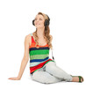 happy teenage girl in big headphones
