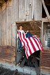 Boy hanging American flag Boy hanging American flag