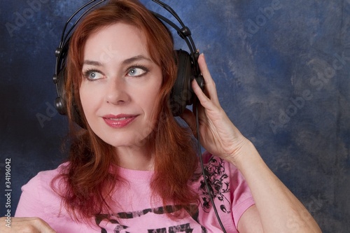 Photo: Redhead with Headphones Redhead with Headphones