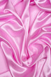 Smooth elegant pink silk as background Smooth elegant pink silk as background