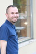 Foto: Smiling young man passes by Smiling young man passes by