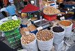 spices, nuts on scales and dishes in old bazaar in Tehran, Iran