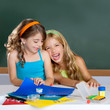 happy  kids student girls at school classroom