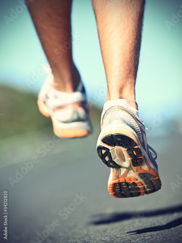 Foto: Runnning shoes on runner Runnning shoes on runner