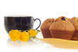 Plum-cakes and blue cup