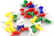 Colorful pushpins on white