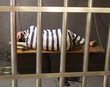 Prisionero en una prisión.