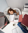 Young woman - financier on office workplace