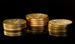 Macro image of gold eagle coin on stack Macro image of gold eagle coin on stack
