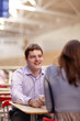 young couple in cafe
