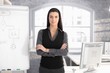 Pretty businesswoman at whiteboard