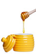 Photo: Honey pot and dipper isolated on white Honey pot and dipper isolated on white