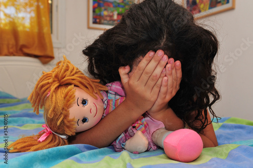 Photo: Young Girl Suffers from Domestic Violence Young Girl Suffers from Domestic Violence