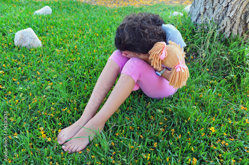 Photo: Young Girl Suffers from Domestic Violence Young Girl Suffers from Domestic Violence