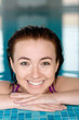 Beautiful girl at the swimming pool