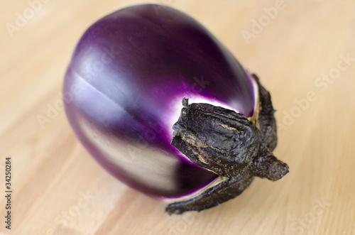 Photo: Eggplant on a wooden background Eggplant on a wooden background