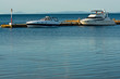 two yachts in sea at mooring two yachts in sea at mooring