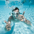 man floats in pool