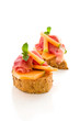 Photo: Bruschetta al Prosciutto e melone - Isolated Bruschetta al Prosciutto e melone - Isolated
