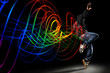 Dancer with Waves of Light Over Black Background Dancer with Waves of Light Over Black Background