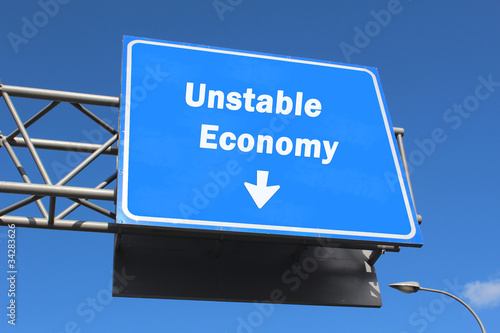 Photo: Unstable Economy - Highway sign Unstable Economy - Highway sign