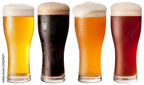 Photo: Four glasses with different beers Four glasses with different beers