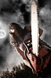 woman with chainsaw