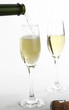 Champagne being poured into a champagne flute