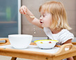 A small girl is eating