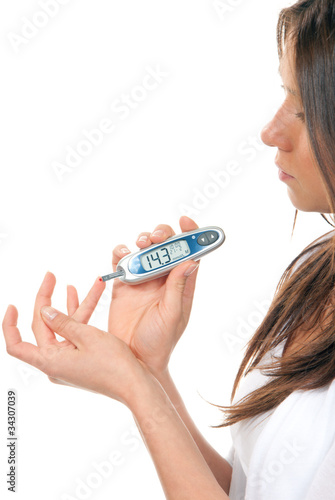 Photo: Diabetes patient measuring glucose level blood test using ultra Diabetes patient measuring glucose level blood test using ultra