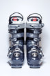 Modern professional ski boots on white background