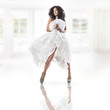 Cute woman wearing white dress