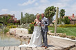 Bride and Groom in the Sunshine next to 18th Tee