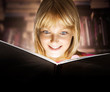 Photo: Kid reading the Book. Education Kid reading the Book. Education